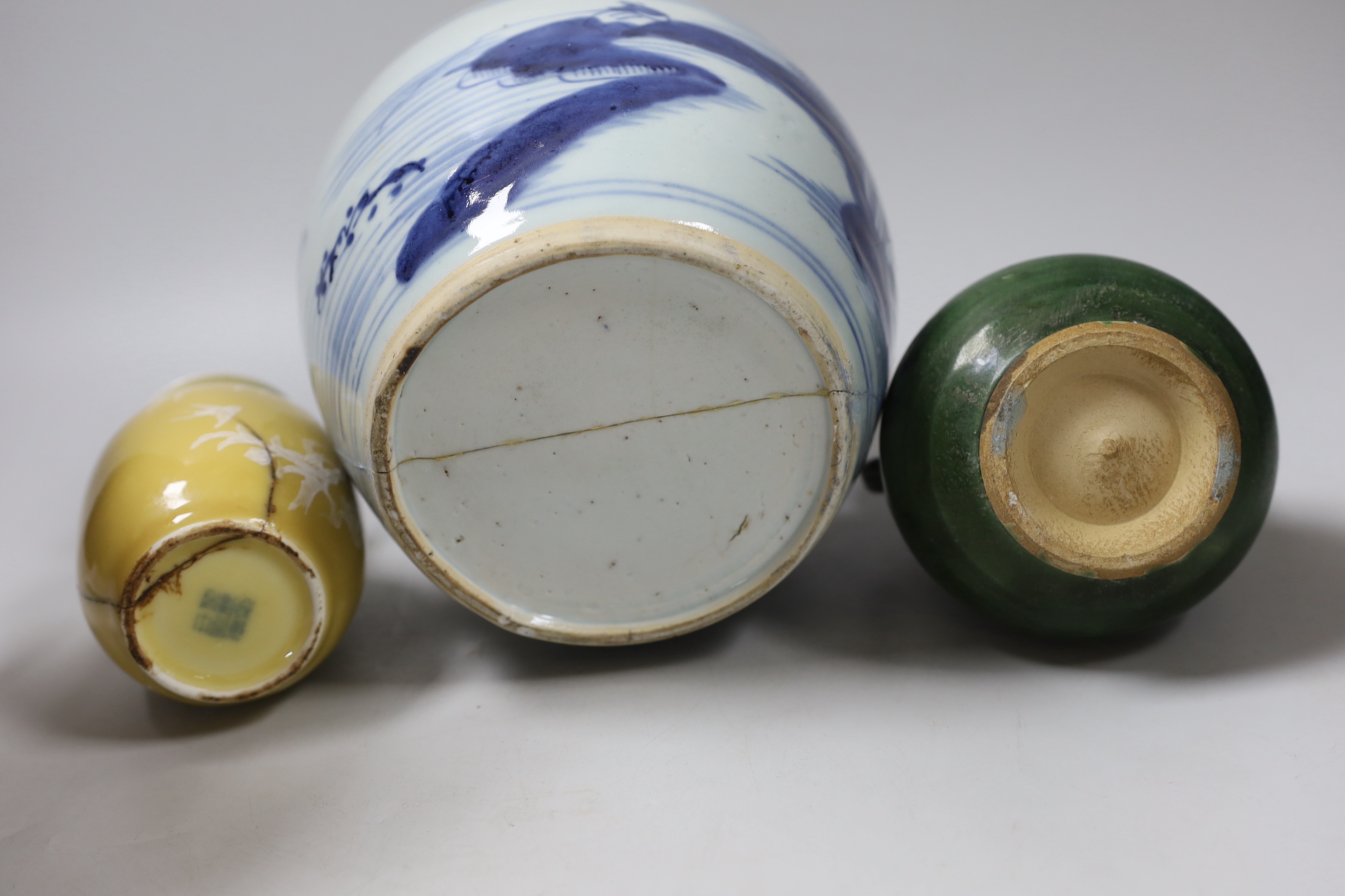 A Chinese blue and white vase, together with a Chinese green two handled double gourd vase and another, tallest 19cm